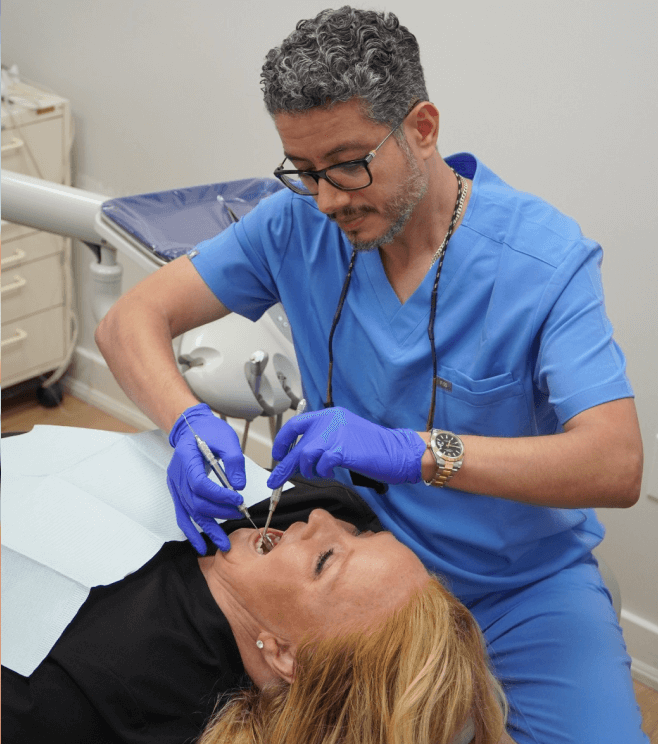 Professional dental team treating patient