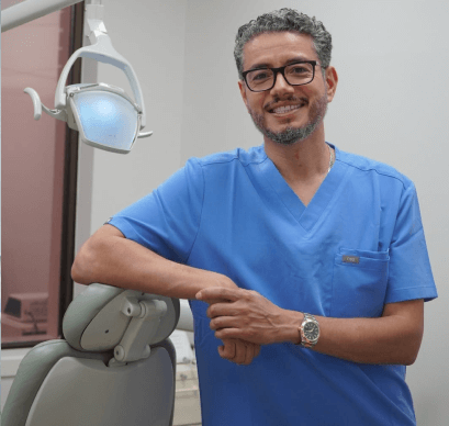 Dentist treating patient with smile